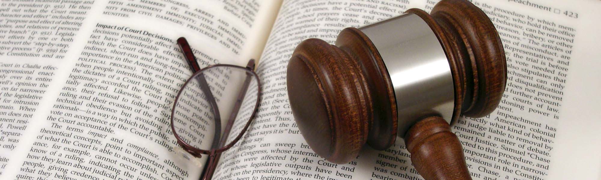 Legal Book, Glasses, and Gavel